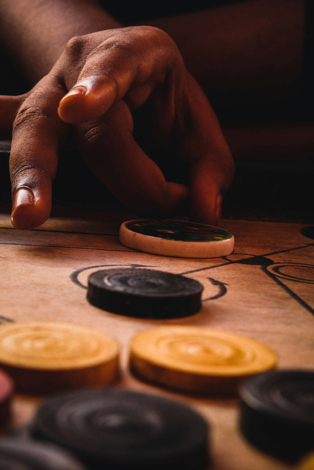 person counting coins on table
